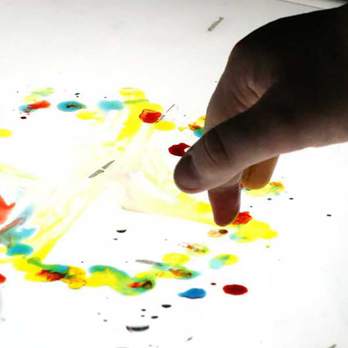 Experimenting with materials in the studio.
