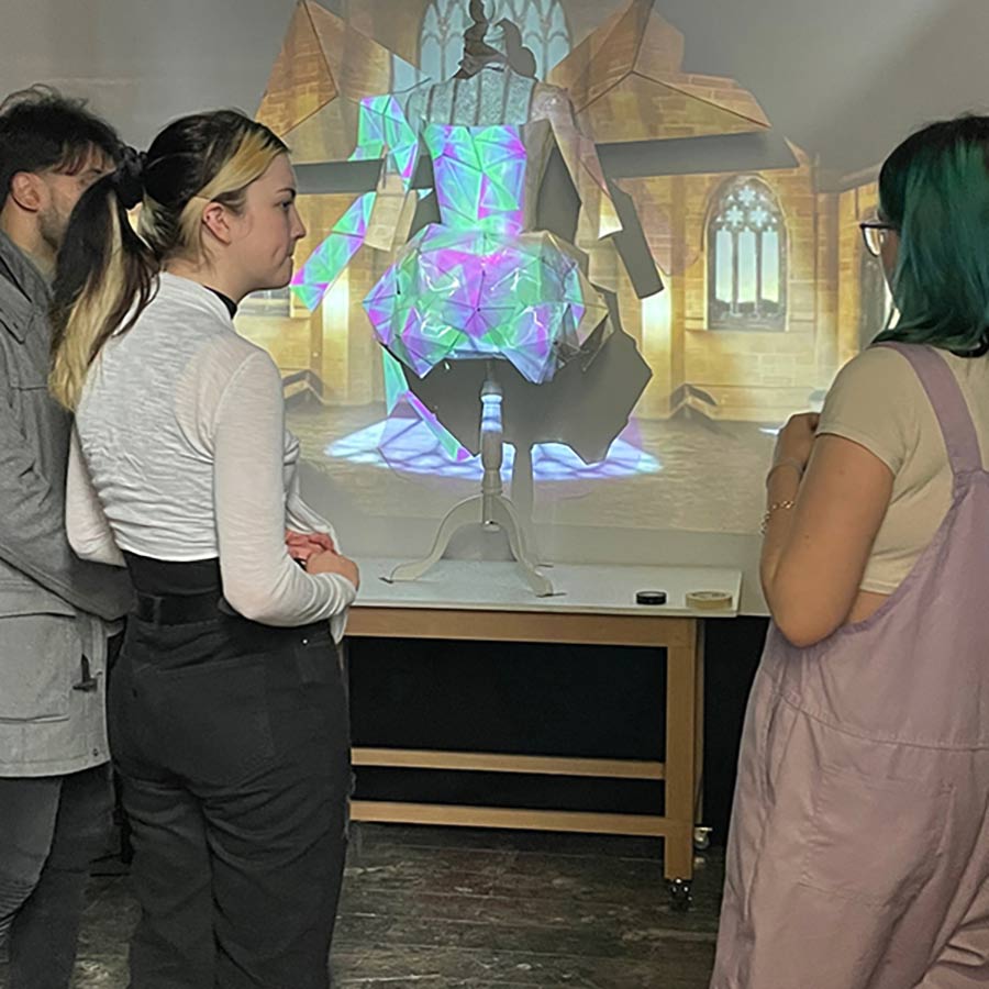 Experimenting with character design and projection mapping in the studio. 