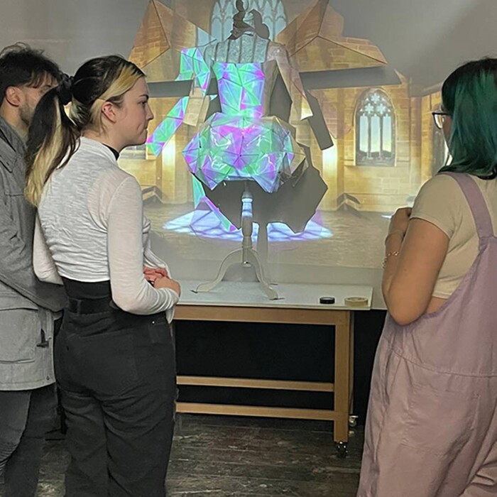 Experimenting with character design and projection mapping in the studio.