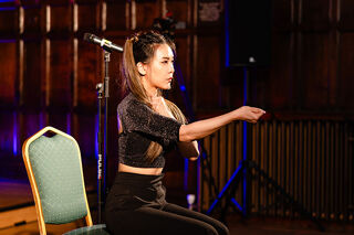 Percussionist Hsuan Wu on chair
