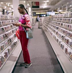 Woman browsing in a music store