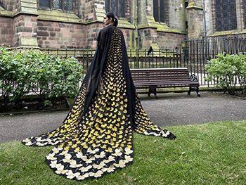 A cape, featuring 802 embroidered shamrocks, designed and produced by Birmingham City University final year student Madelaine Atkinson 2 crop
