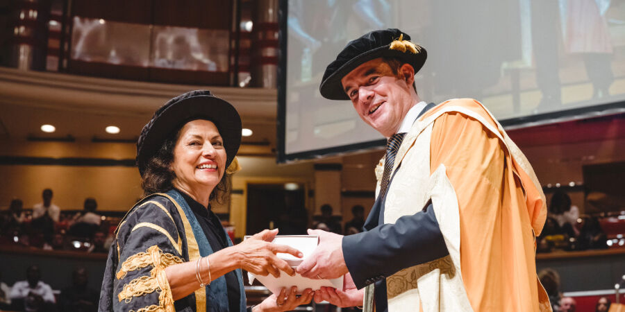 BCU Chair Anita Bhalla and Dr Graham Herries at Symphony Hall