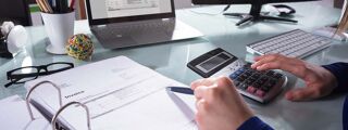 AF PG Courses 1200x450 - Business person at a desk