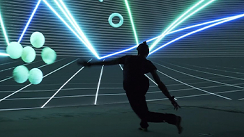 Holosphere image featuring a person in front of a big screen digitally showing their activity