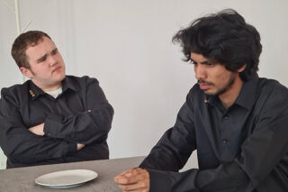 Three male RBC acting students in a scene with wiring
