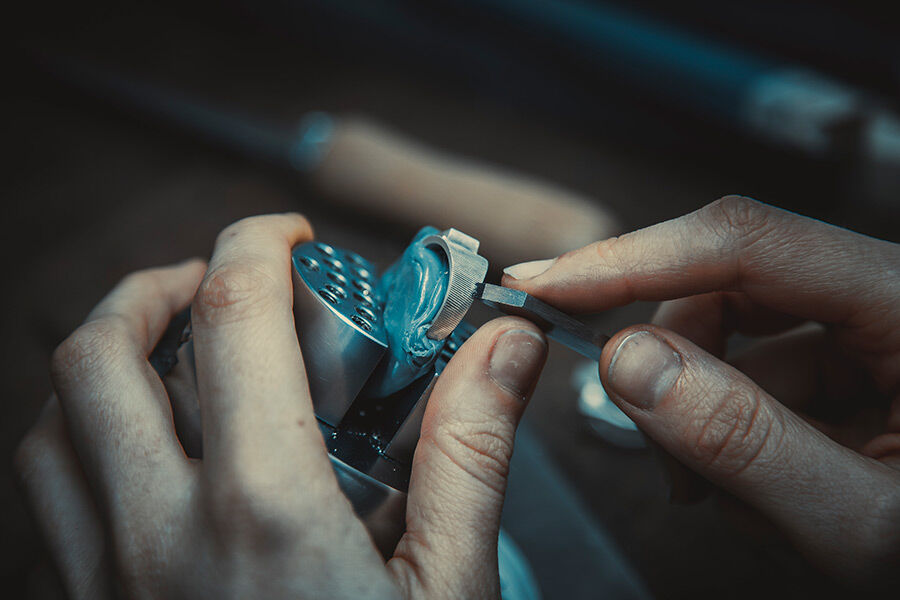 Close up of student's hands creating a ring