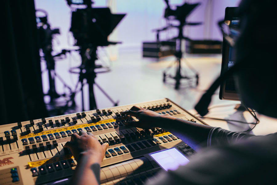 Student using the technological equipment in Studio A