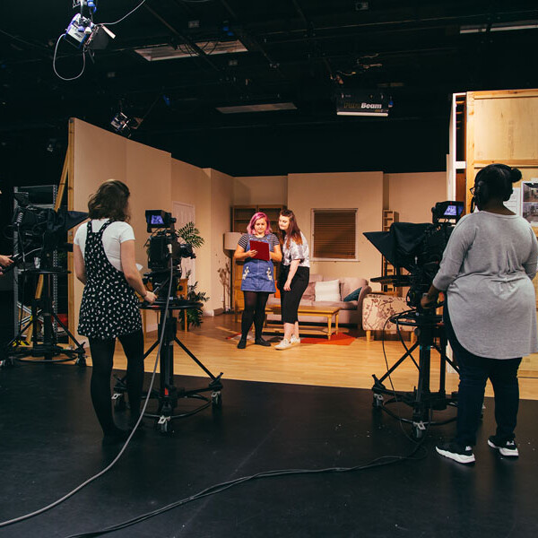 Students filming in studio C