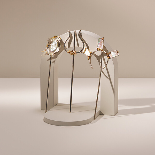 Jewellery and Silversmithing HND student work of three brass ornaments