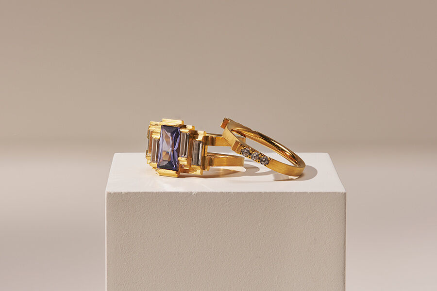 Jewellery and Silversmithing HND student work of two gold rings with jewels