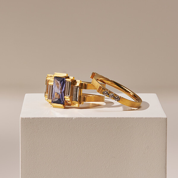 Jewellery and Silversmithing HND student work of two gold rings with jewels
