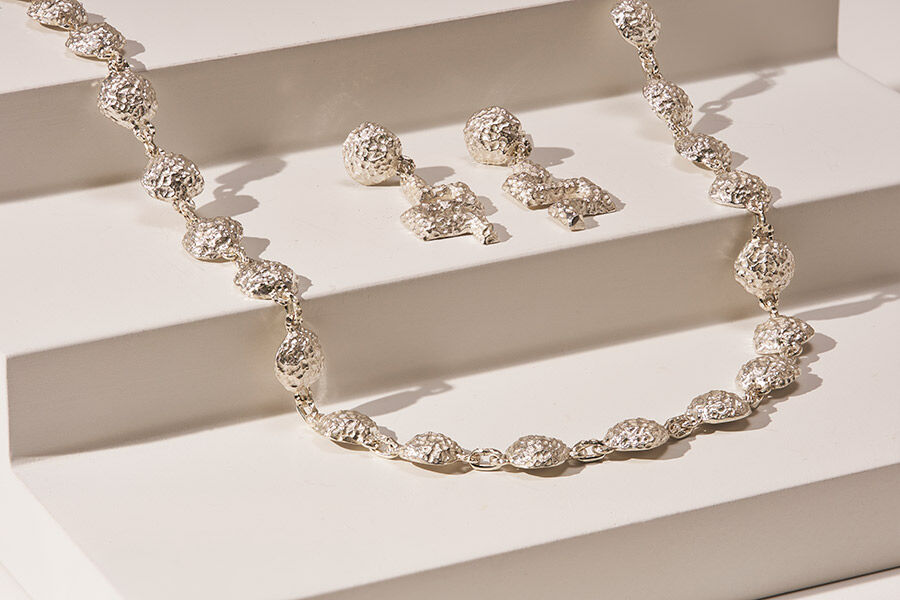 Jewellery and Silversmithing HND student work of silver necklace and earrings