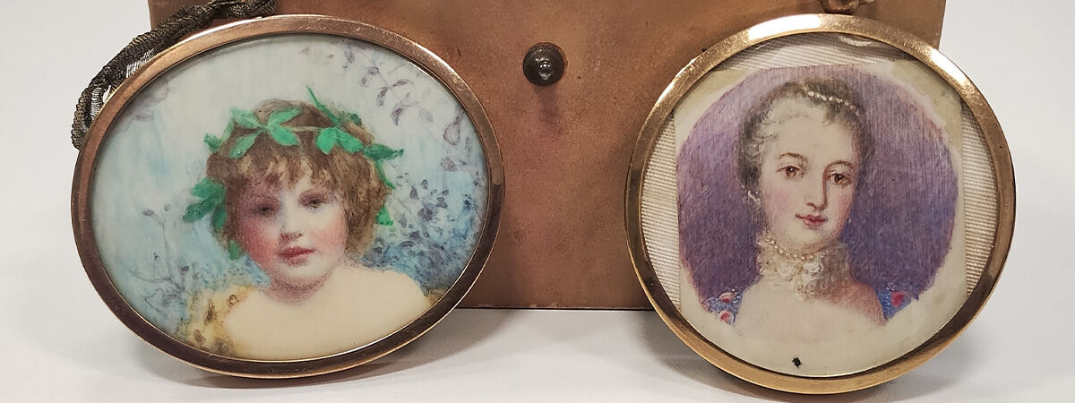 Two pin badges