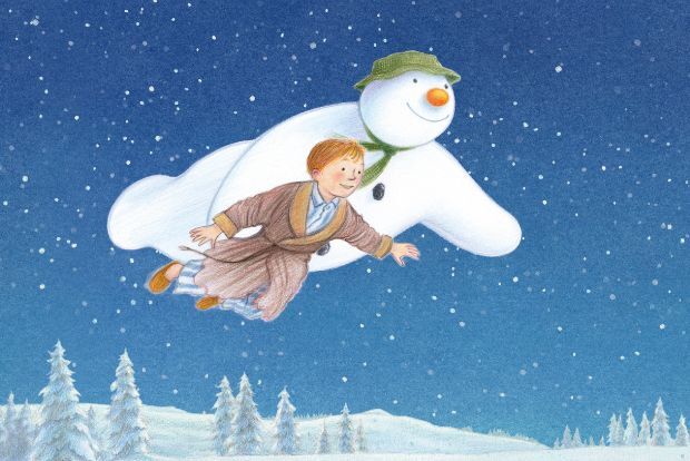 The snowman and little boy from the animated film The Snowman, flying