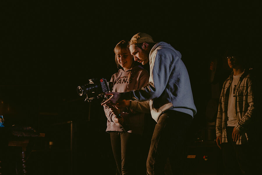 Students looking through a camera