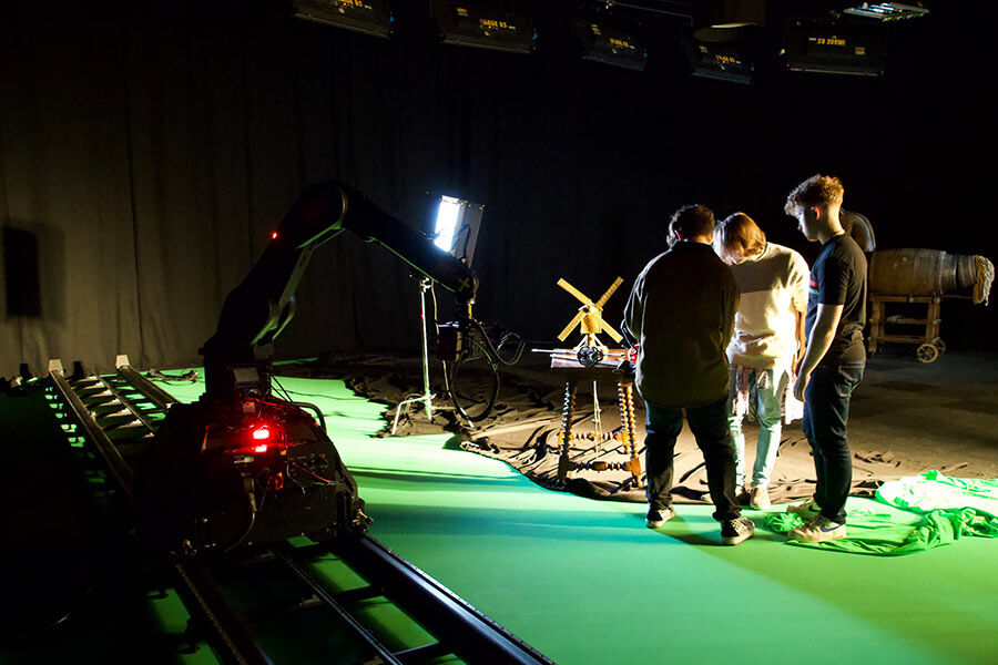 Students using film studio set