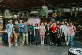 A group photo of individuals from the business Brew.