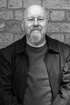 Brian Homer in black and white with a beard