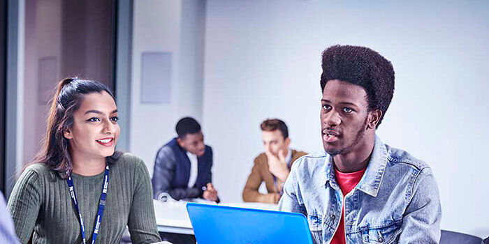 Student Quotes Business 700x350 - People at a desk
