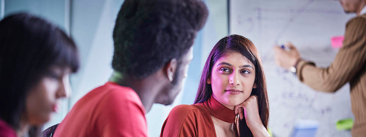 Business Management (Professional Practice) Course Image 1200x450 - Men and women at a table