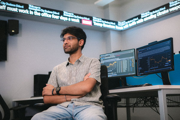Business student in the Curzon CITY Trading Room