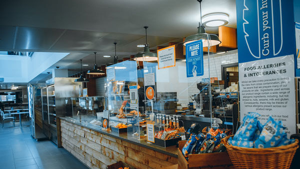 the till with pastries, crisps and a seclection of snacks in the curzon canteen