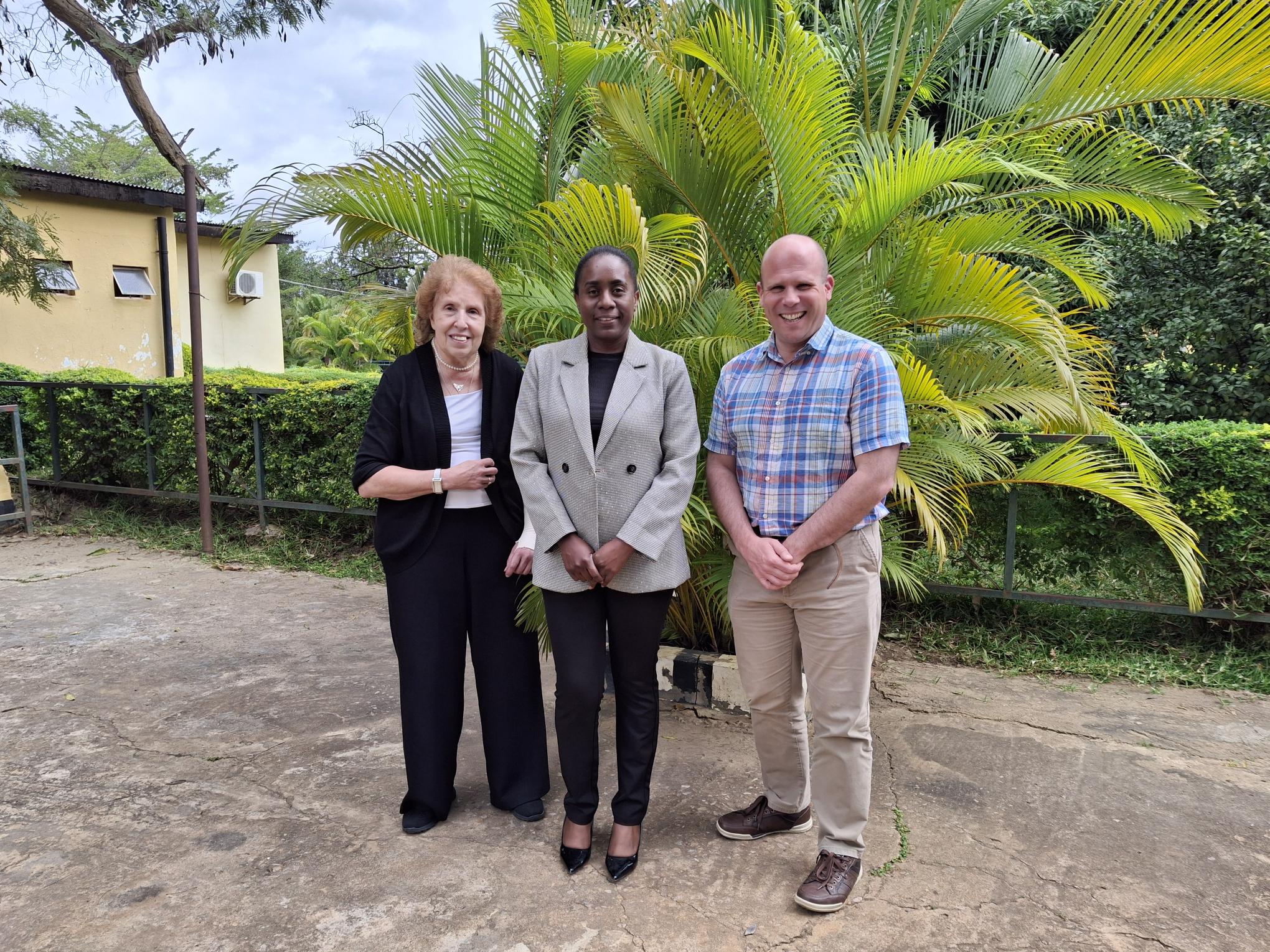 Three nursing professionals standing together in Zambia