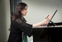 Antonia Bates composing at piano