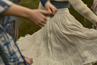 Young people dancing in the countryside