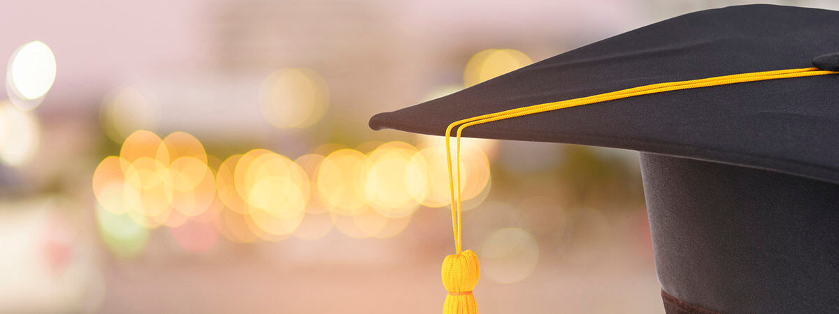 Desecuritising 1200x450 - Graduation cap