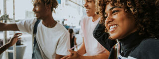 Black teenagers enjoying time in the city centre.