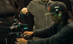 Digital media student using a camera
