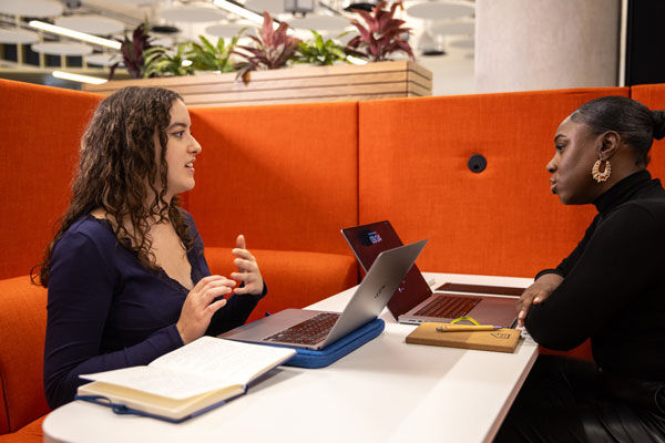 A meeting between an enterprise advisor and a student in BCU's Enterprise hub in STEAMhouse