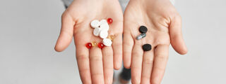 Holding pills in hand