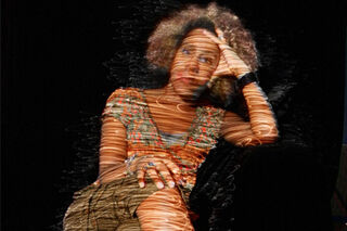 Composer Errollyn Wallen reclining