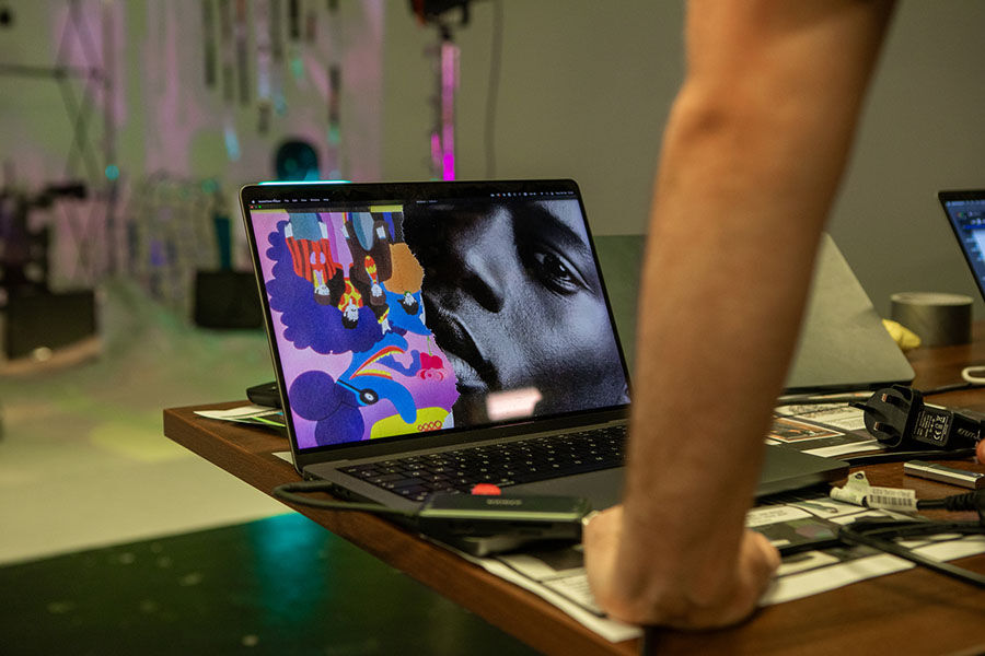 Student editing work on a laptop