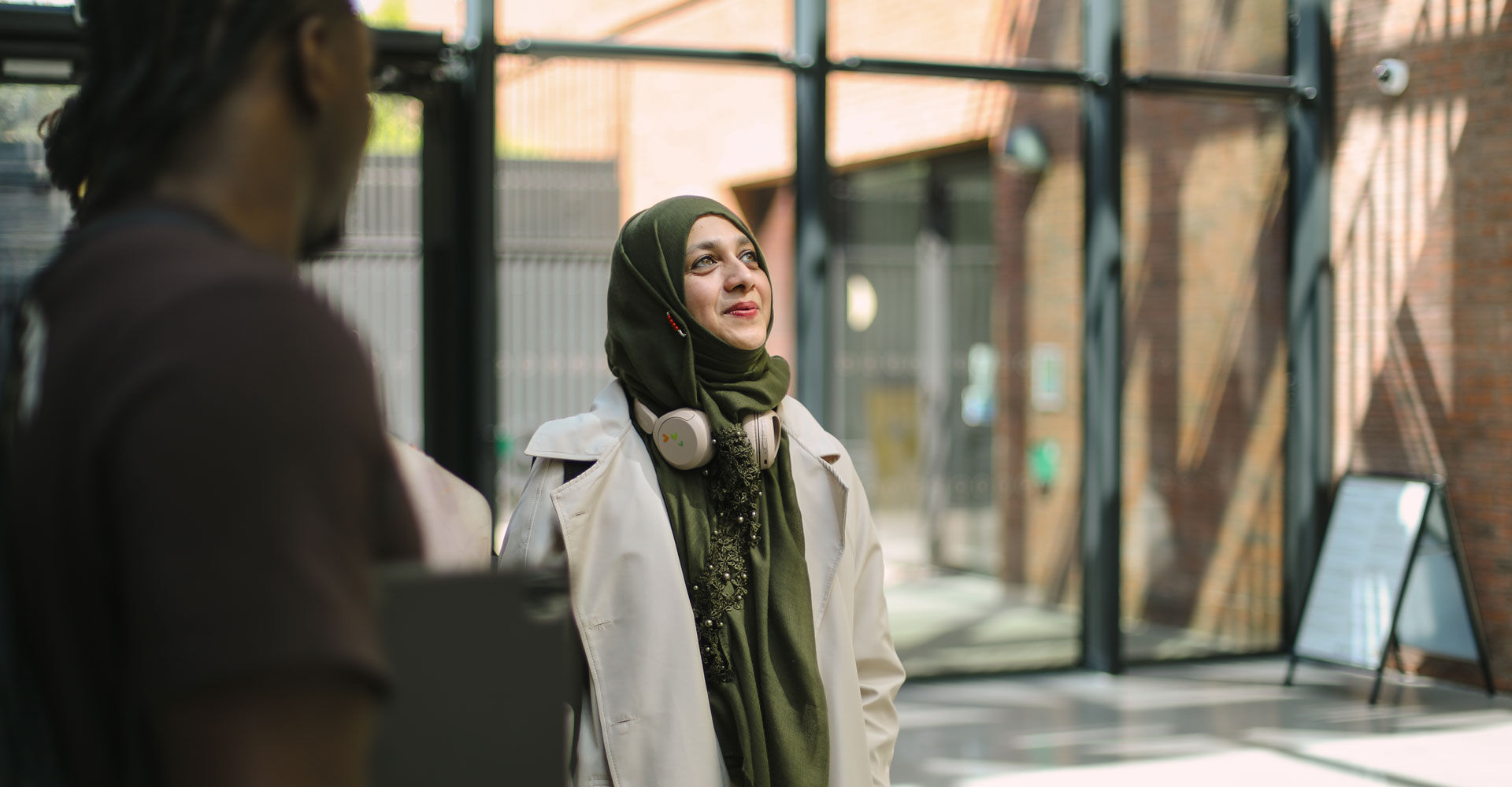 A student looks around the STEAMhouse building