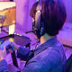 Person playing a video game with headset