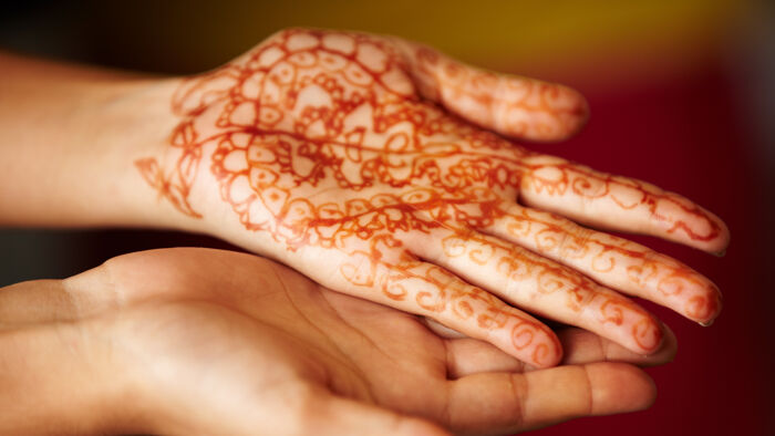 Hand with henna on