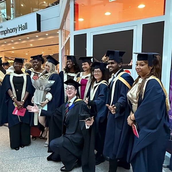 Students and lecturer at Graduation 2024