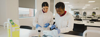 Two students in health science lab