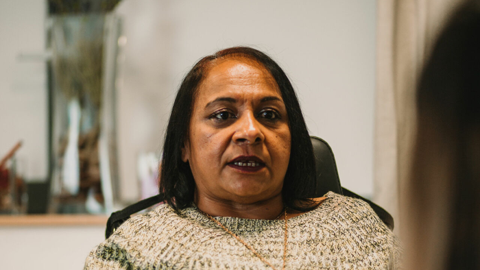 Woman in wheelchair talking