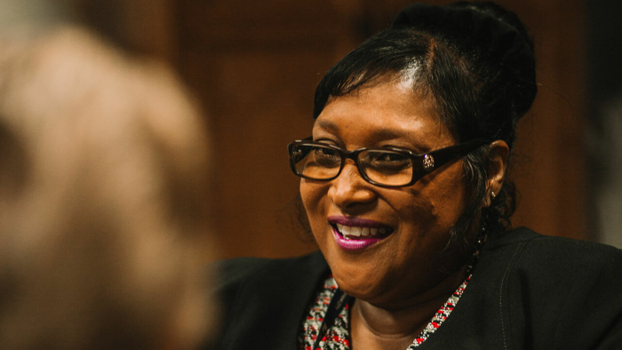 Woman in glasses laughing