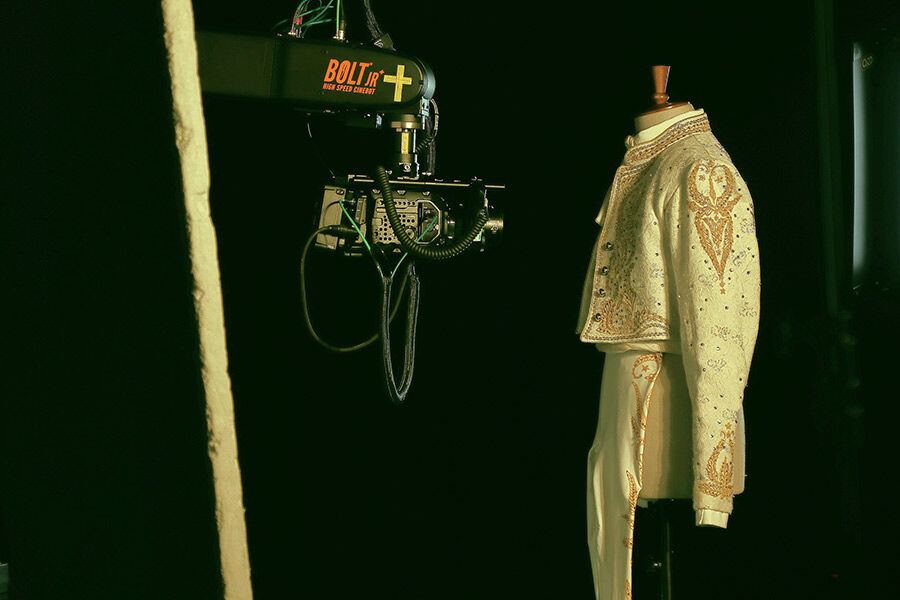 Camera shooting at outfit on mannequin