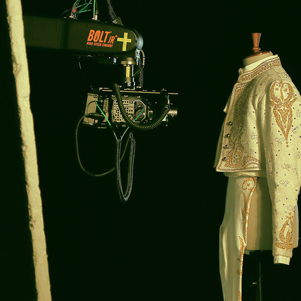 Camera shooting at outfit on mannequin