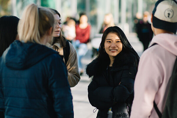 International students chatting on campus