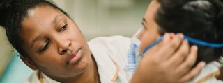 Student nurses practise their skills