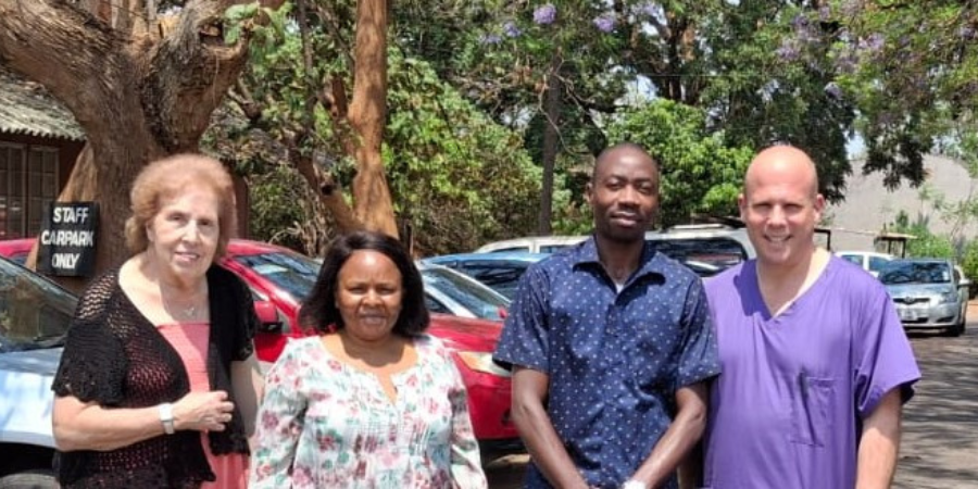 L-R Professor Joy Notter, Sabelo Maphenduka, Hilary Mulenga, Associate Professor Chris Carter