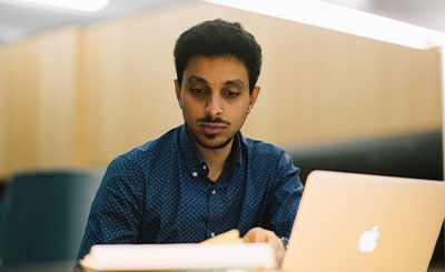 Research student in the library